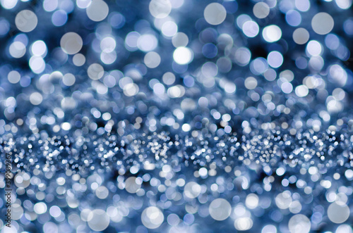 Abstract blue bokeh background for design.