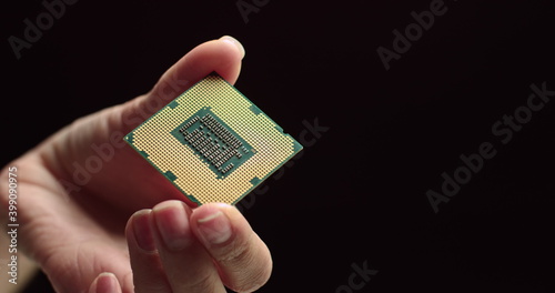 Fotografie CPU in hands of a technician