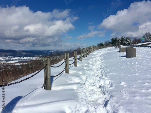 Beautiful scenic view after snowstorm. Winter scene in upstate New York. Overlooking the valley from the hill