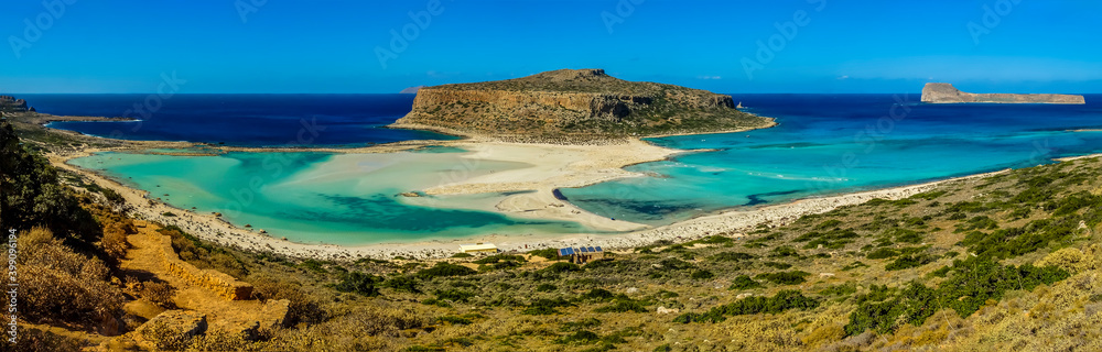 A view from the lower trail of Balos Beach, the azure lagoons and Gramvousa, Crete on a bright sunny day