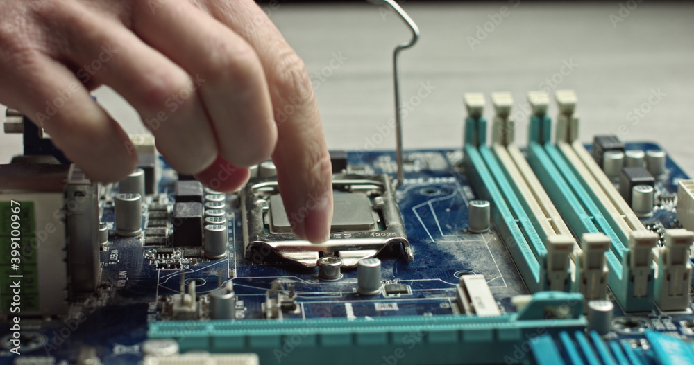 the dolly video of the CPU socket of the computer's motherboard. the concept of computer, motherboard, hardware and technology. the dolly video of the CPU socket of the computer's motherboard. the concept of computer, motherboard, hardware and technology.