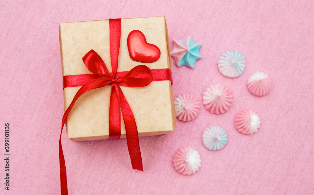 Box with bow and sweets. Lollipop heart. Flat layout. Box with bow and sweets. Lollipop heart. Flat layout.