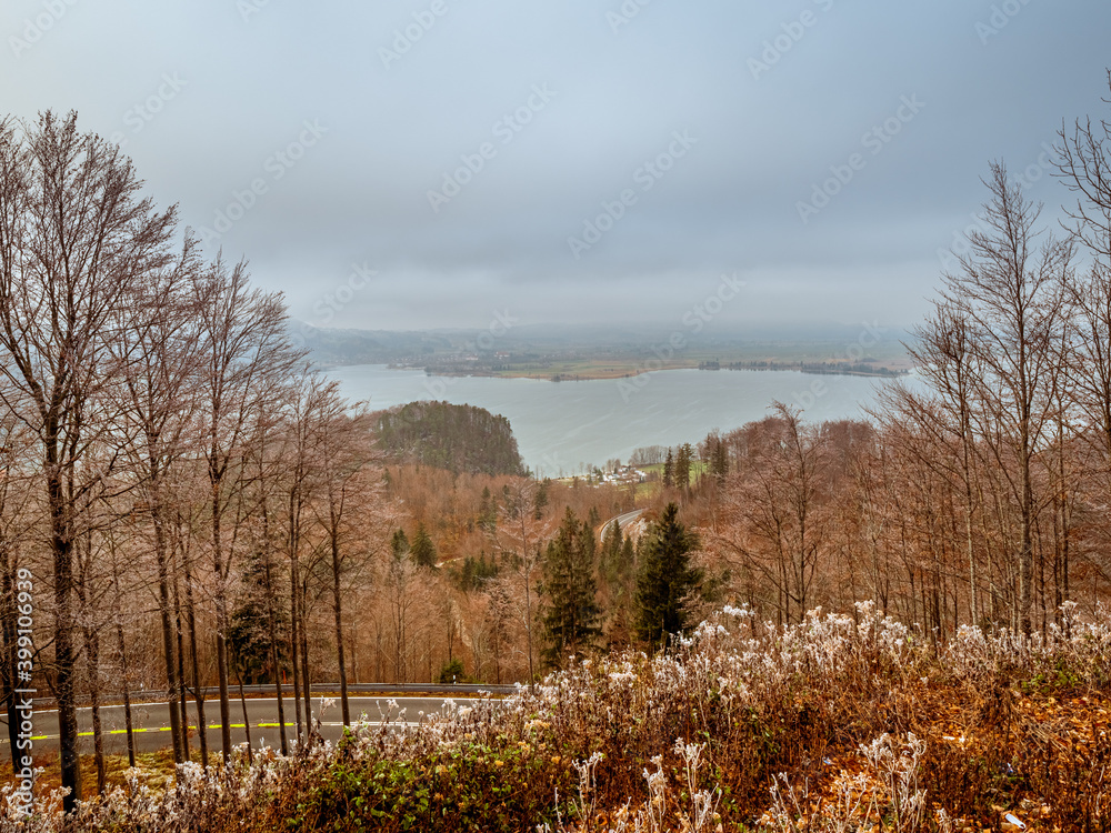 Kochelsee lake view during a cloudy day with sunrise light Kochelsee lake view during a cloudy day with sunrise light