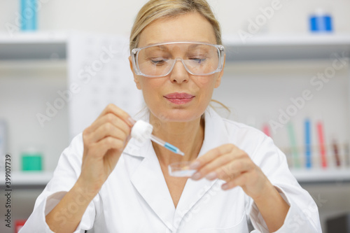 mature woman doing lab research