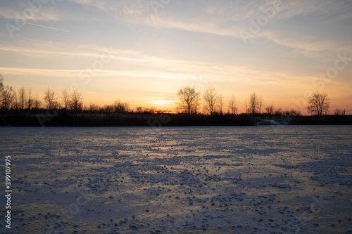 Winter sunset on a frozen river