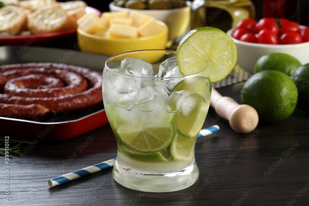 Caipirinha, a typical Brazilian cocktail made with lemon, cachaça and sugar Caipirinha, a typical Brazilian cocktail made with lemon, cachaça and sugar