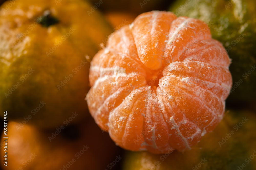 Fresh ripe mandarins background close up, macro, selective focus Fresh ripe mandarins background close up, macro, selective focus