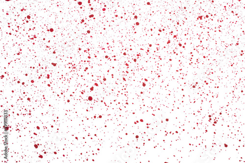 Red spots of paint and dust on a white background.