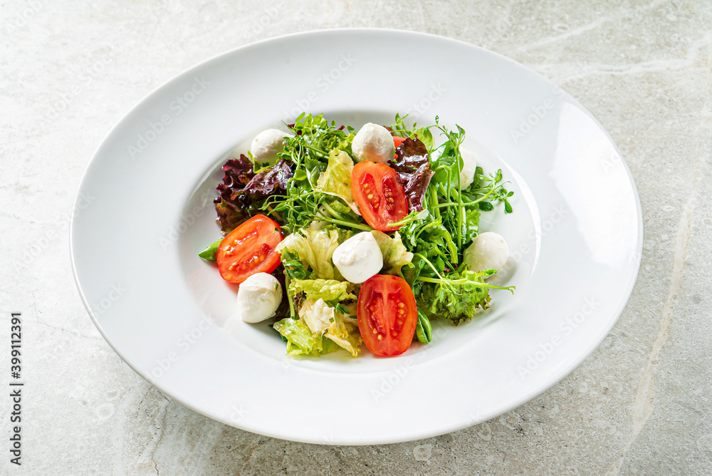 fresh salad with mozzarella and vegetables fresh salad with mozzarella and vegetables