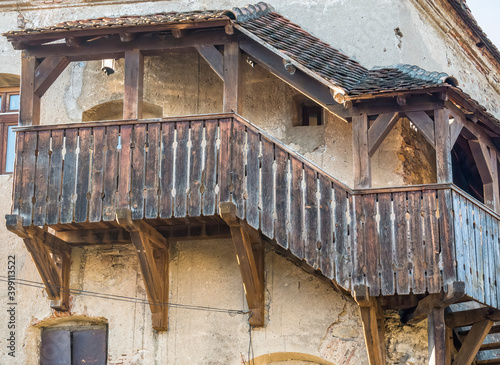 Detail with a medieval wooden covered staircase in Sighisoara, Romania.