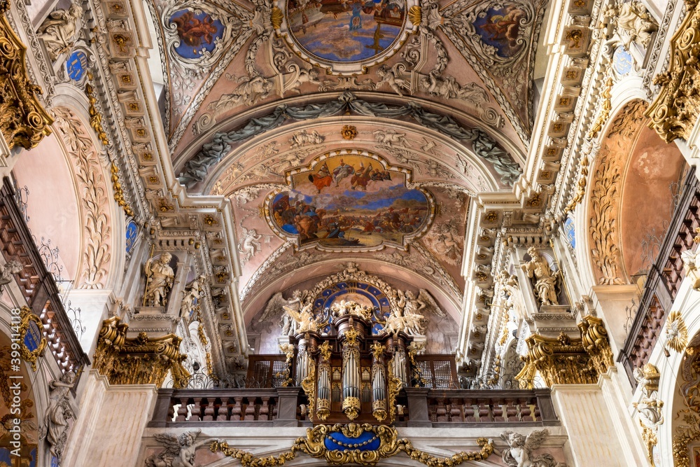 BROUMOV, CZECH REPUBLIC - OCTOBER 10, 2020: The Benedictine monastery with  the church of St Adalbert from 14th century. Beautiful baroque Catholic church interior in Broumov, Czechia