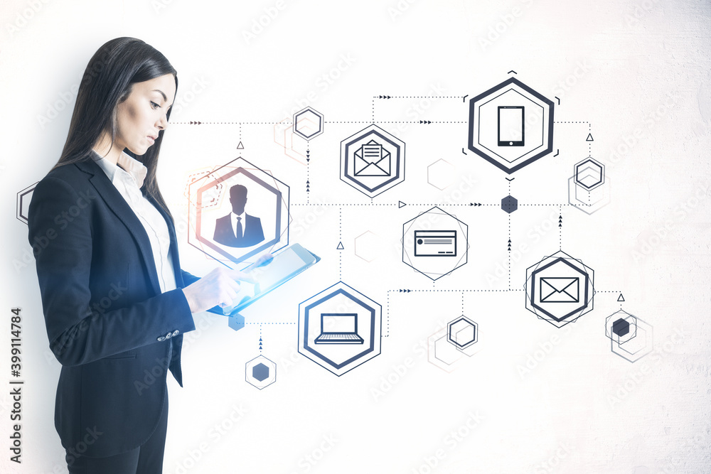 Young businesswoman using tablet computer and drawing computer cloud diagram Young businesswoman using tablet computer and drawing computer cloud diagram