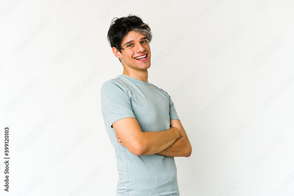 Young skinny hispanic man happy, smiling and cheerful. Young skinny hispanic man happy, smiling and cheerful.
