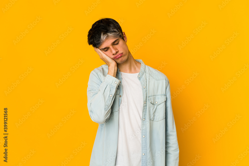 Young skinny hispanic man who is bored, fatigued and need a relax day. Young skinny hispanic man who is bored, fatigued and need a relax day.