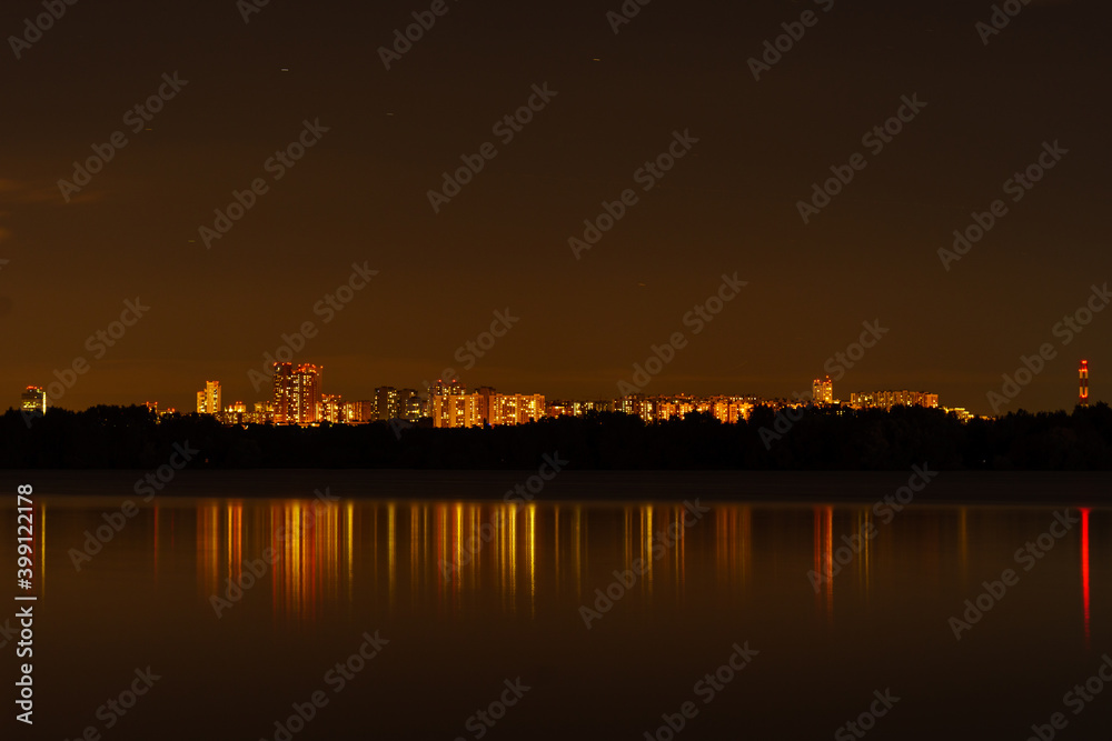 View of the lights of the city through the bay, night shooting.