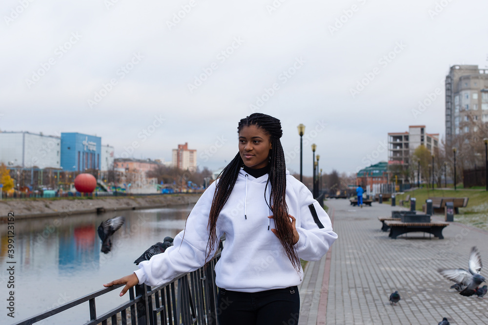 happy African American woman in a full-length Park happy African American woman in a full-length Park