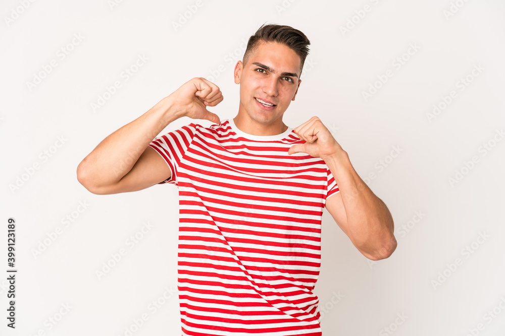 Young caucasian handsome man isolated feels proud and self confident, example to follow. Young caucasian handsome man isolated feels proud and self confident, example to follow.