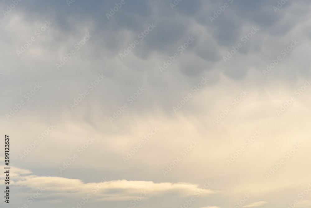 Luminous cloudscape as a beautifully textured nature background

