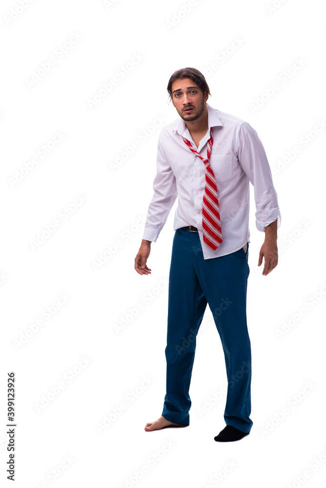 Young unhappy male employee isolated on white