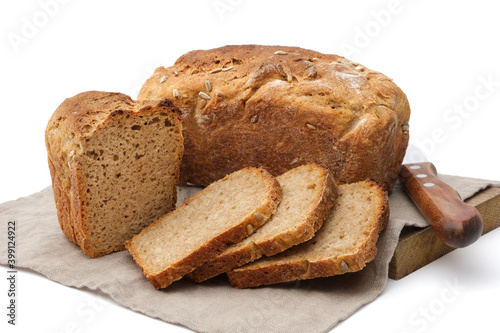 Homemade bread. Traditional sourdough freshly baked bread and bread slice on white.