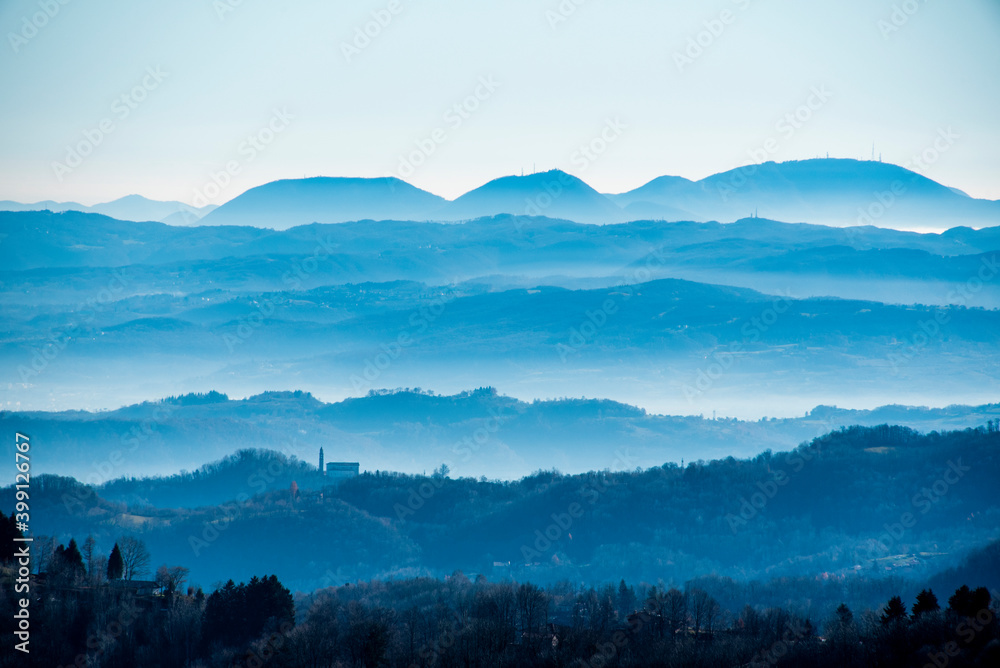 stratified fog between the hills three