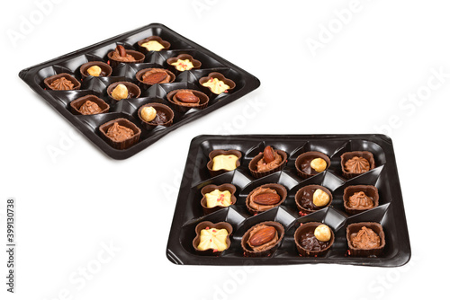 Chocolate candy collection in plastic box. © Nikolay