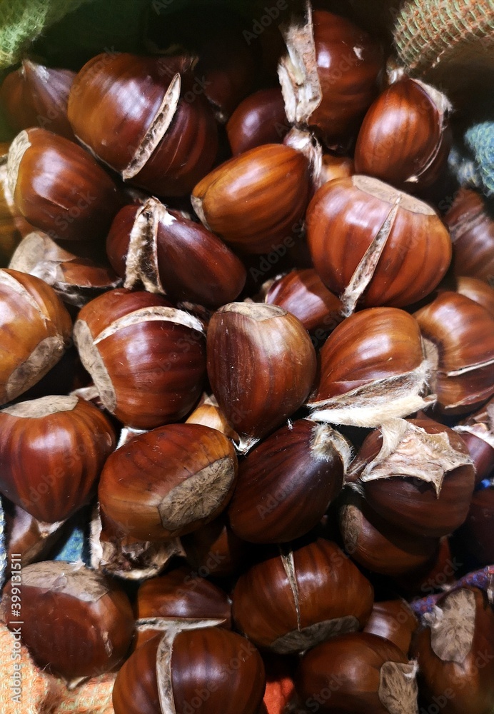 Obraz premium Close up of roasted chestnuts - autumn flavors 