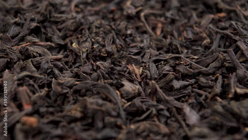 Dried black tea leaves close-up. Macro. Dolly Shot Dried black tea leaves close-up. Macro. Dolly Shot