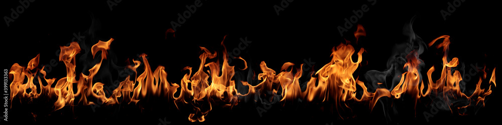 Texture of real fire flames and sparks isolated on black background Texture of real fire flames and sparks isolated on black background