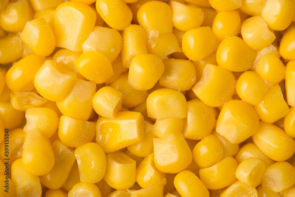 Close-up top above view photo of yellow bright sweet canned corn textured background Close-up top above view photo of yellow bright sweet canned corn textured background