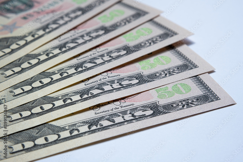 Macro photo of new 50 US dollar banknotes. Concept image for finance and banking. Macro photo of new 50 US dollar banknotes. Concept image for finance and banking.
