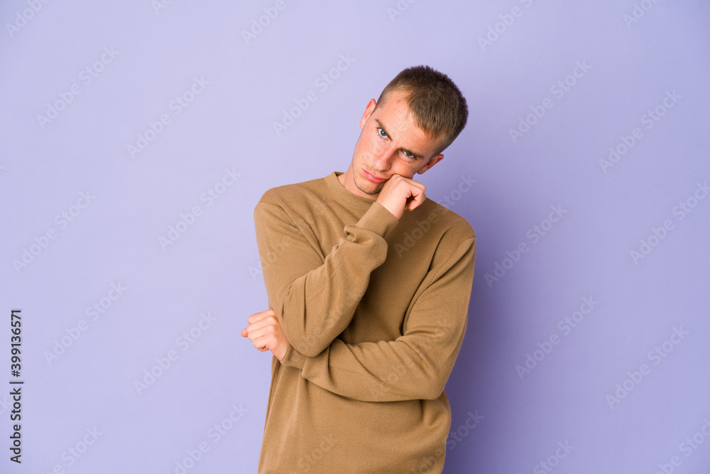 Young caucasian handsome man tired of a repetitive task. Young caucasian handsome man tired of a repetitive task.