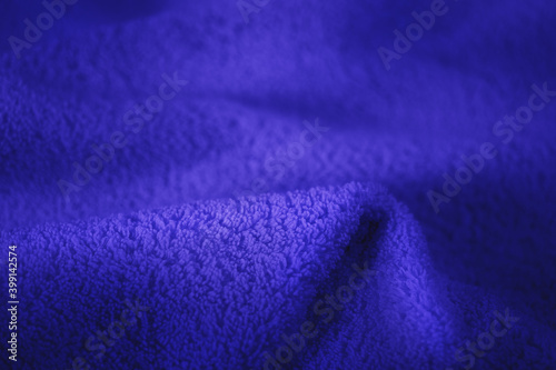 Abstract deep blue trendy color luxury background, piece of cloth or microfiber.