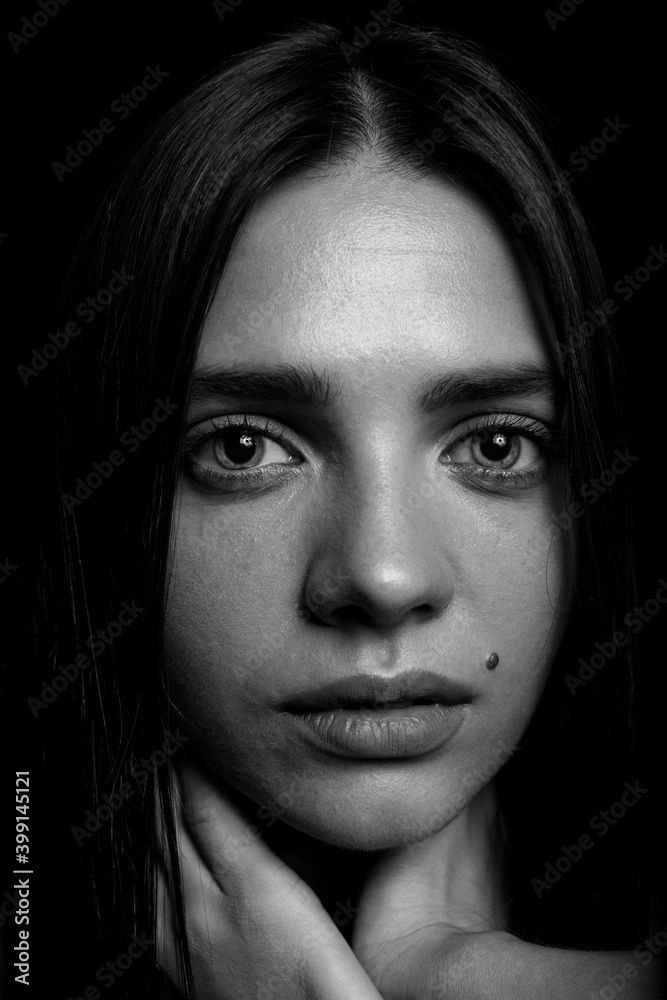 Black and white portrait of a young woman Black and white portrait of a young woman