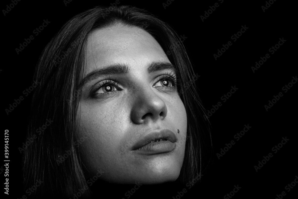 Fototapeta premium Black and white portrait of a young woman
