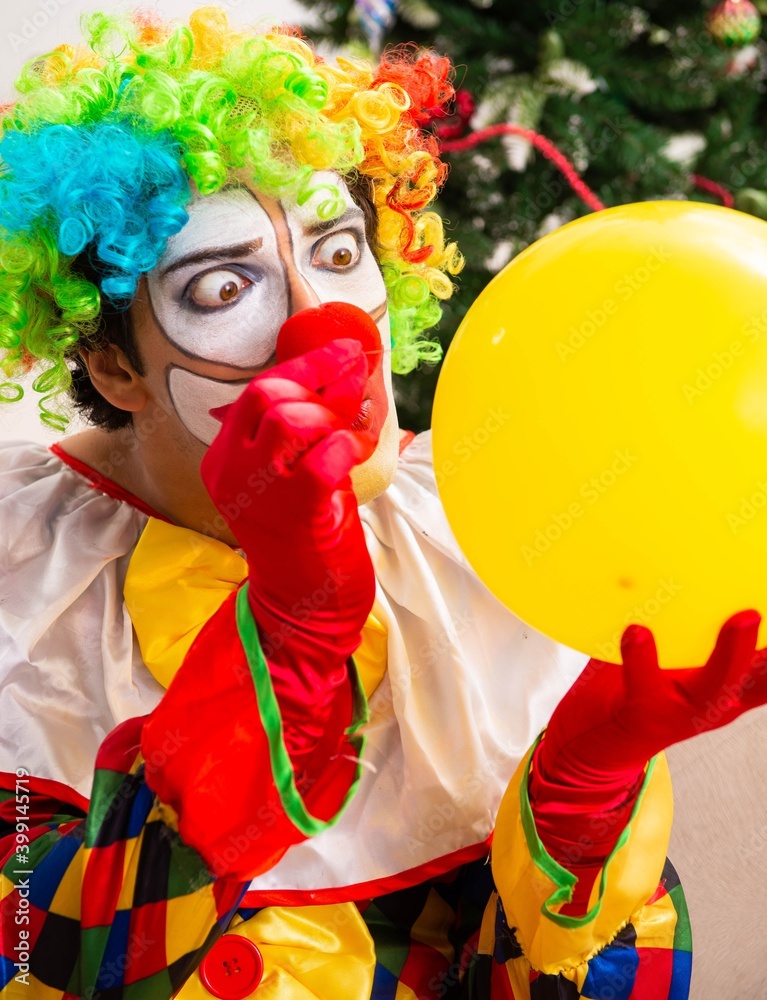 Funny clown in Christmas celebration concept Funny clown in Christmas celebration concept