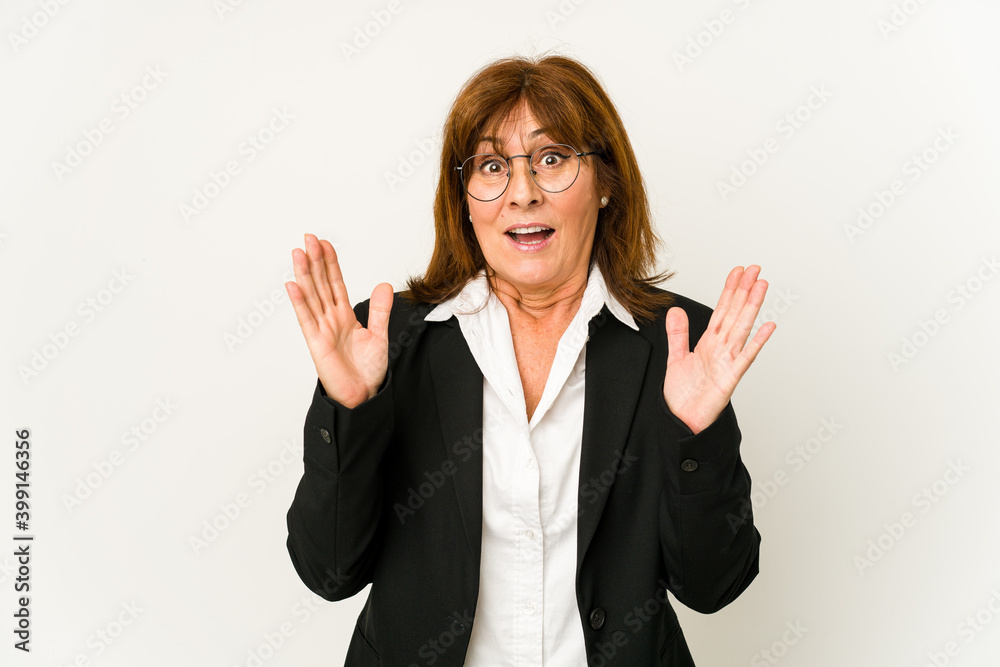 Middle age caucasian business woman isolated surprised and shocked. Middle age caucasian business woman isolated surprised and shocked.