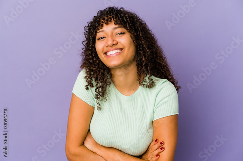 Young african american afro woman isolated laughing and having fun.
