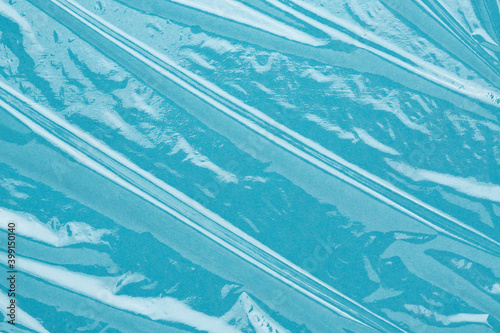 Fotografia Wrinkled cling film, plastic texture, vinyl background
