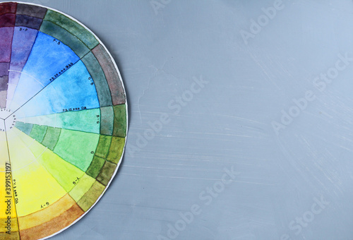 Watercolor abstract colorful blue and yellow circle for artist on gray background with copy space for text or picture. Art creative photo for artist, sketchbook, coloring book