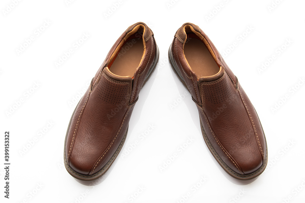 Pair of Brown Slip on Shoes Isolated on White Background Pair of Brown Slip on Shoes Isolated on White Background