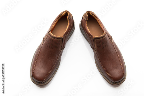 Pair of Brown Slip on Shoes Isolated on White Background