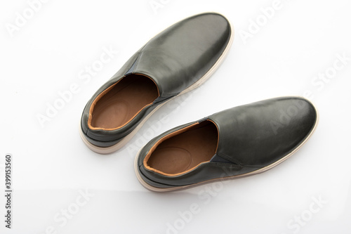 Top View of Pair of Dark Blue Slip on Shoes Isolated on White Background