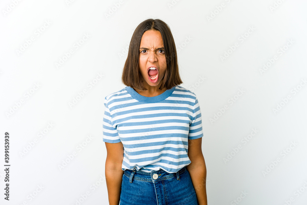 Young mixed race woman shouting very angry, rage concept, frustrated. Young mixed race woman shouting very angry, rage concept, frustrated.