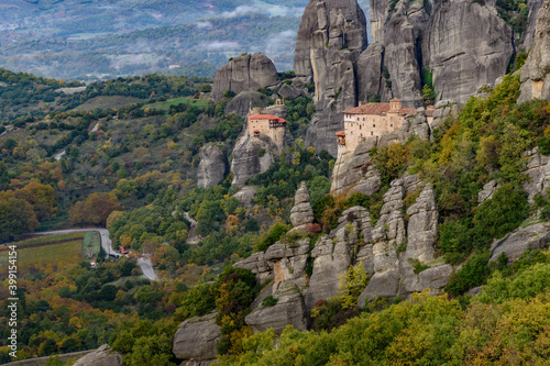 Roussanou and Αgios Nikolaos monastery, an unesco world heritage site,  located on a unique rock formation  above the village of Kalambaka during fall season.