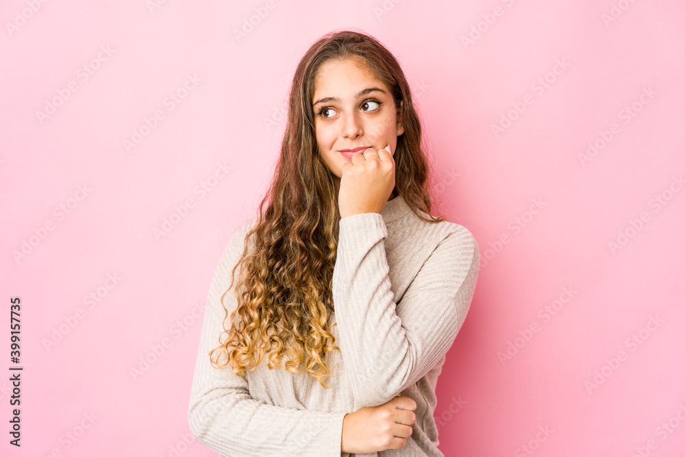 Young caucasian woman relaxed thinking about something looking at a copy space. Young caucasian woman relaxed thinking about something looking at a copy space.