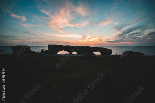 sunset at the arches park in newfoundland