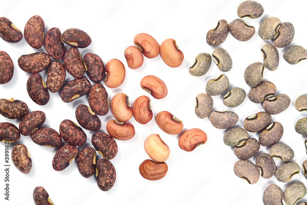 Naklejka premium Top view of a group of dry nuts, gray, brown on white background