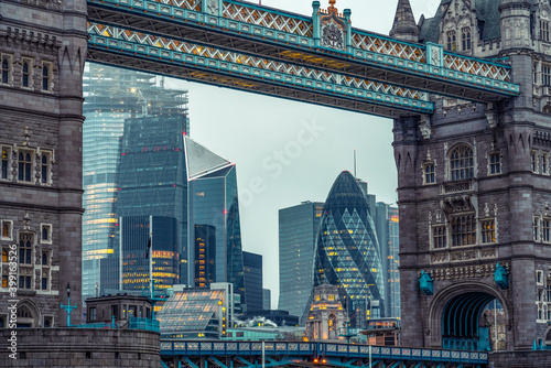 Photography London skyscrapers viewed through Tower Bridge in London. England