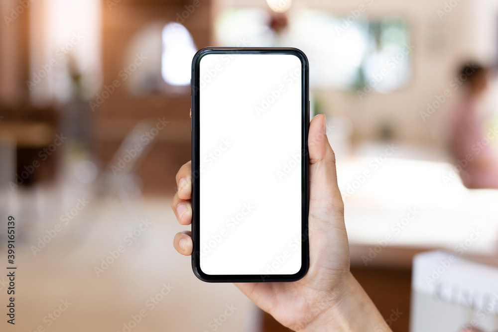 cell phone blank white screen mockup.woman hand holding texting using mobile on desk at office.background empty space for advertise.work people contact marketing business,technology cell phone blank white screen mockup.woman hand holding texting using mobile on desk at office.background empty space for advertise.work people contact marketing business,technology